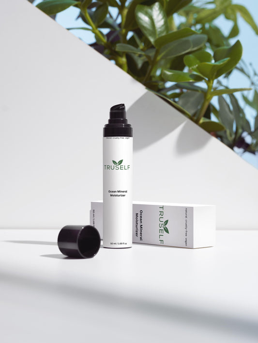 Ocean Mineral Moisturizer bottle with open black cap and TRUSELF box