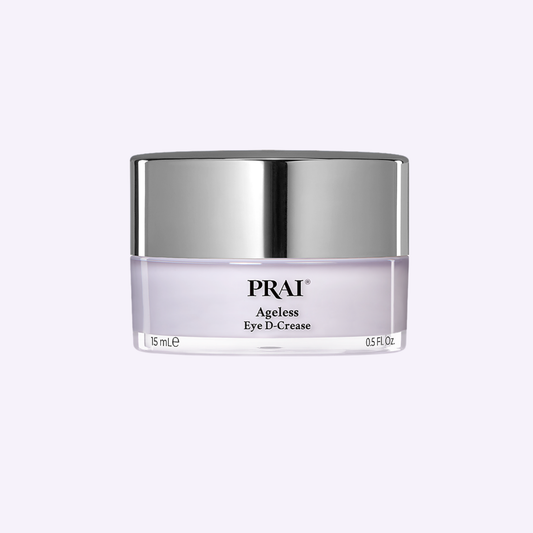 Eye cream jar with silver lid and clear label, PRAI Ageless Eye D-Crease, 15 mL