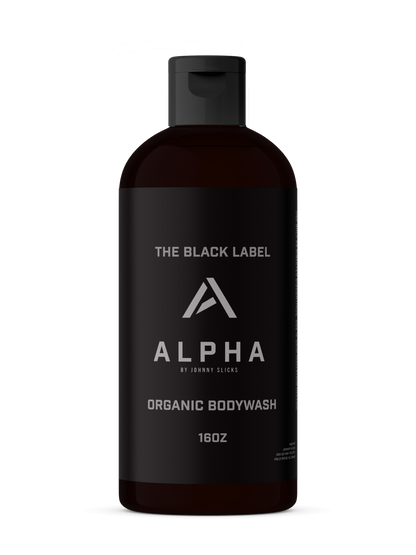 Alpha body wash bottle with black label and pump, dark charcoal-colored liquid