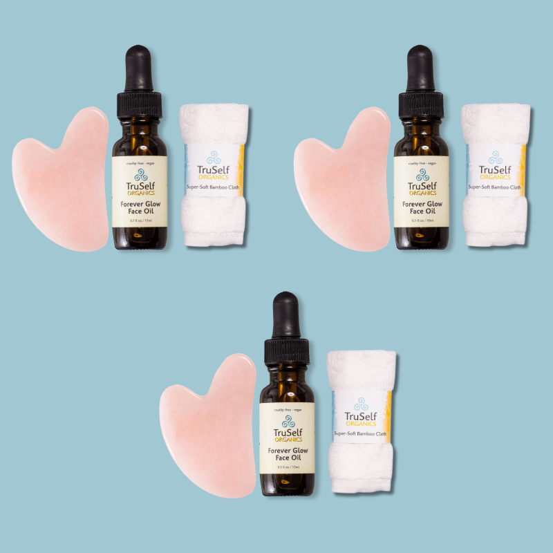 Anti-aging facial massage kit shown as multiple sets: rose quartz gua sha, face oil, bamboo cloth