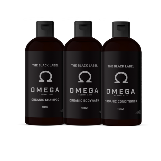 Johnny Slicks Omega organic shower set, three dark pump bottles: shampoo, body wash, conditioner.