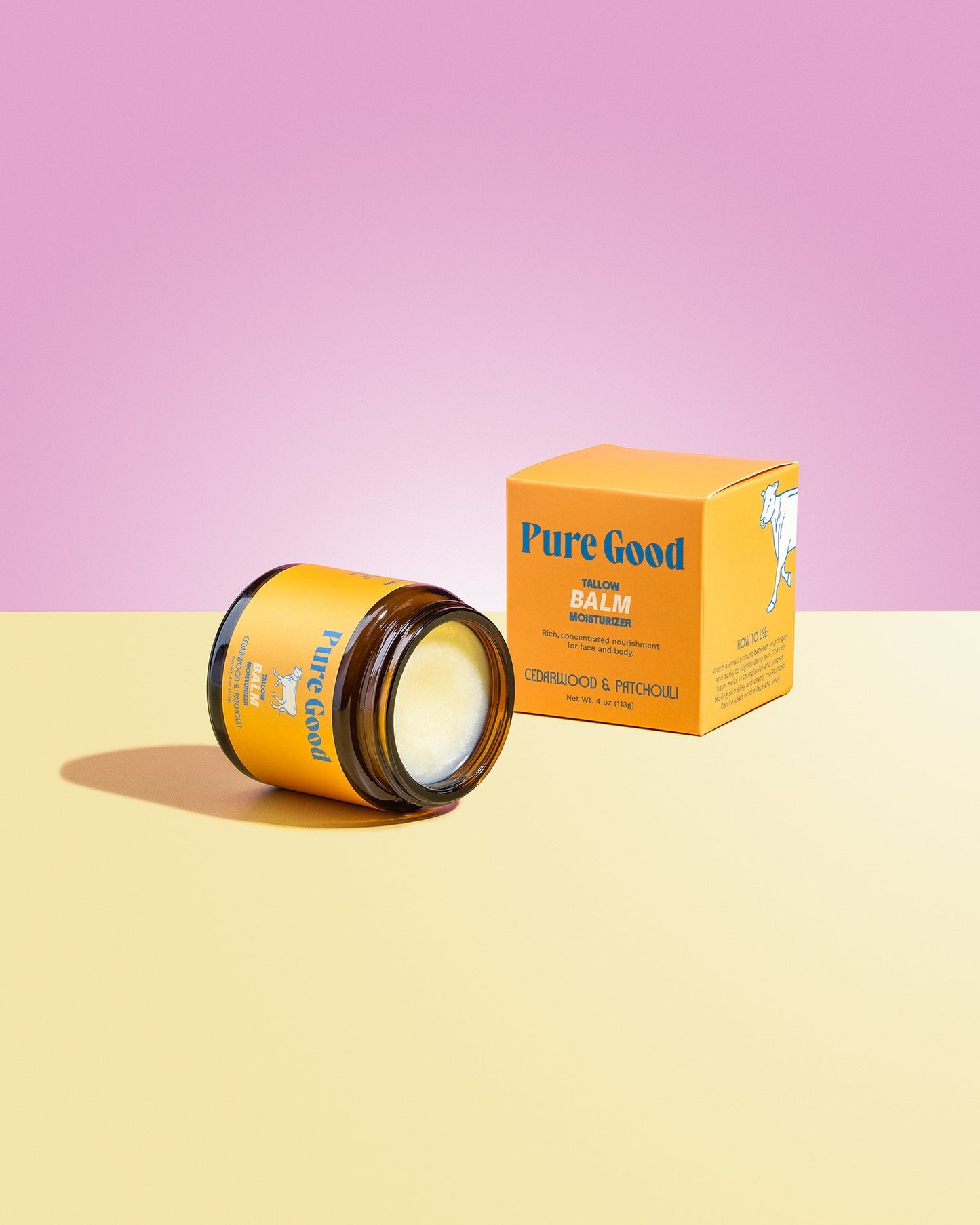 Tallow balm jar and orange Pure Good carton, cedarwood & patchouli