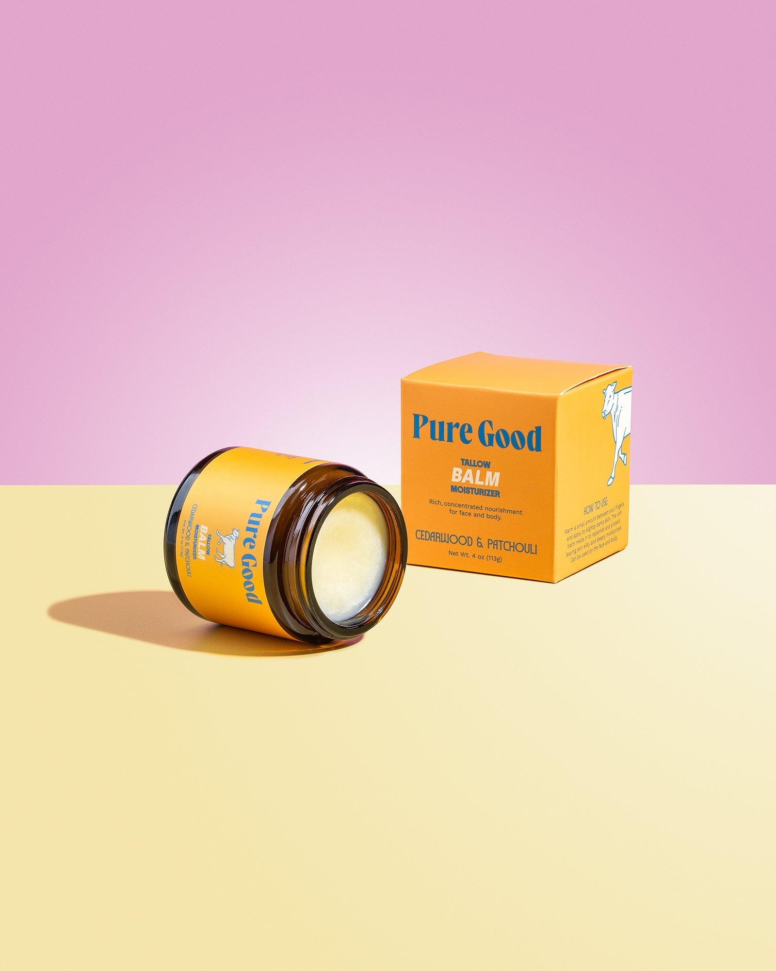 Tallow balm jar and orange Pure Good carton, cedarwood & patchouli