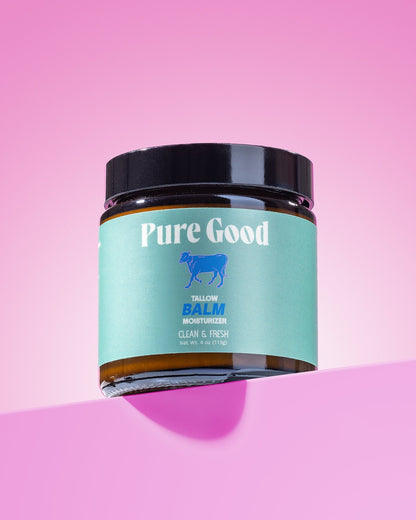 Tallow balm jar with black lid and teal label, Clean & Fresh wording.