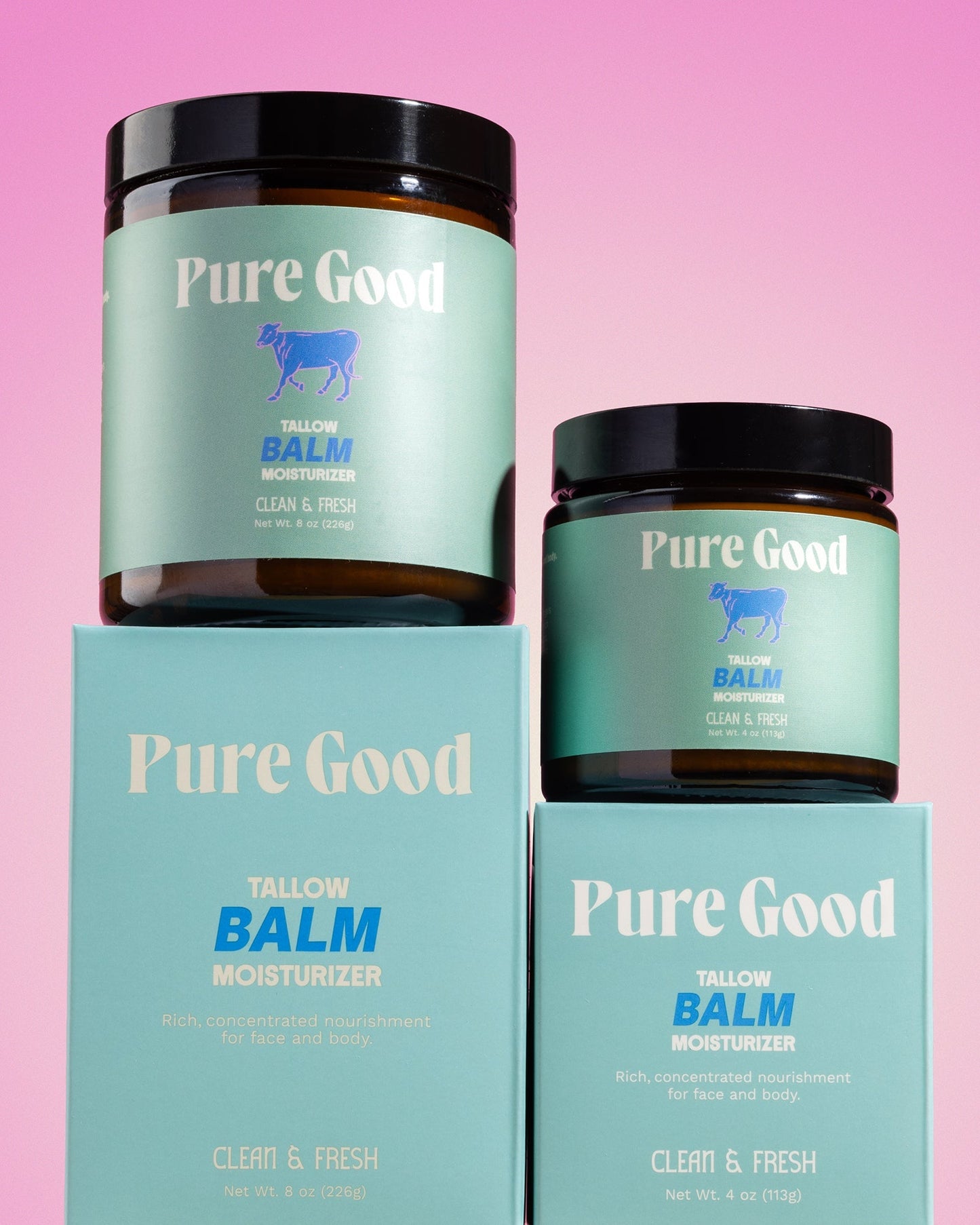 Tallow balm jars and cartons, multiple sizes with teal labels.
