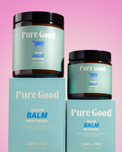 Tallow balm jars and cartons, multiple sizes with teal labels.