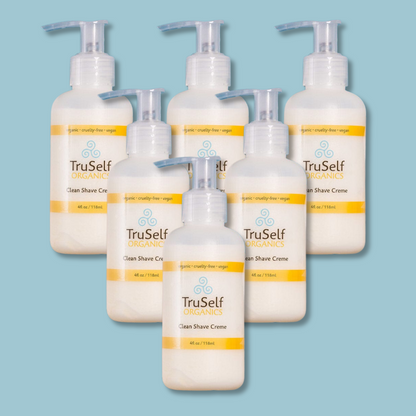 Clean Shave Creme set of five pump bottles with orange-banded labels