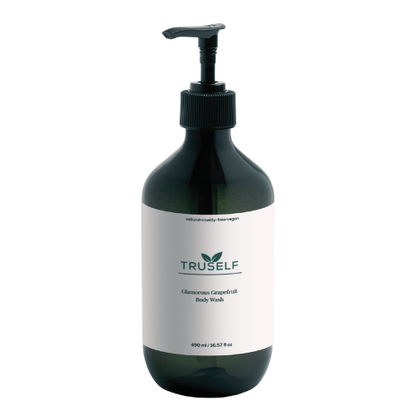 Body wash bottle with blue-toned pump, dark green bottle, white grapefruit label