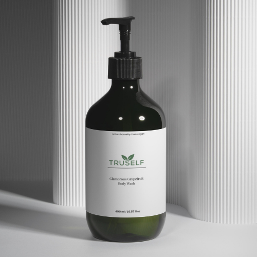 Body wash bottle with black pump, dark green bottle, white label for body wash