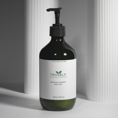 Body wash bottle with black pump, dark green bottle, white label for body wash