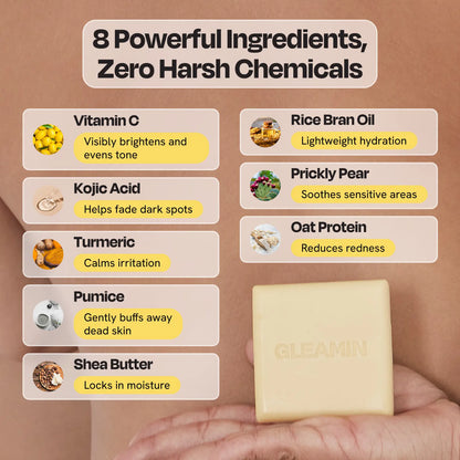 Pale yellow cleansing bar, square soap with GLEAMIN logo held in hand
