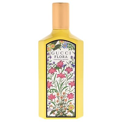 Refillable eau de parfum spray bottle with floral label and gold cap