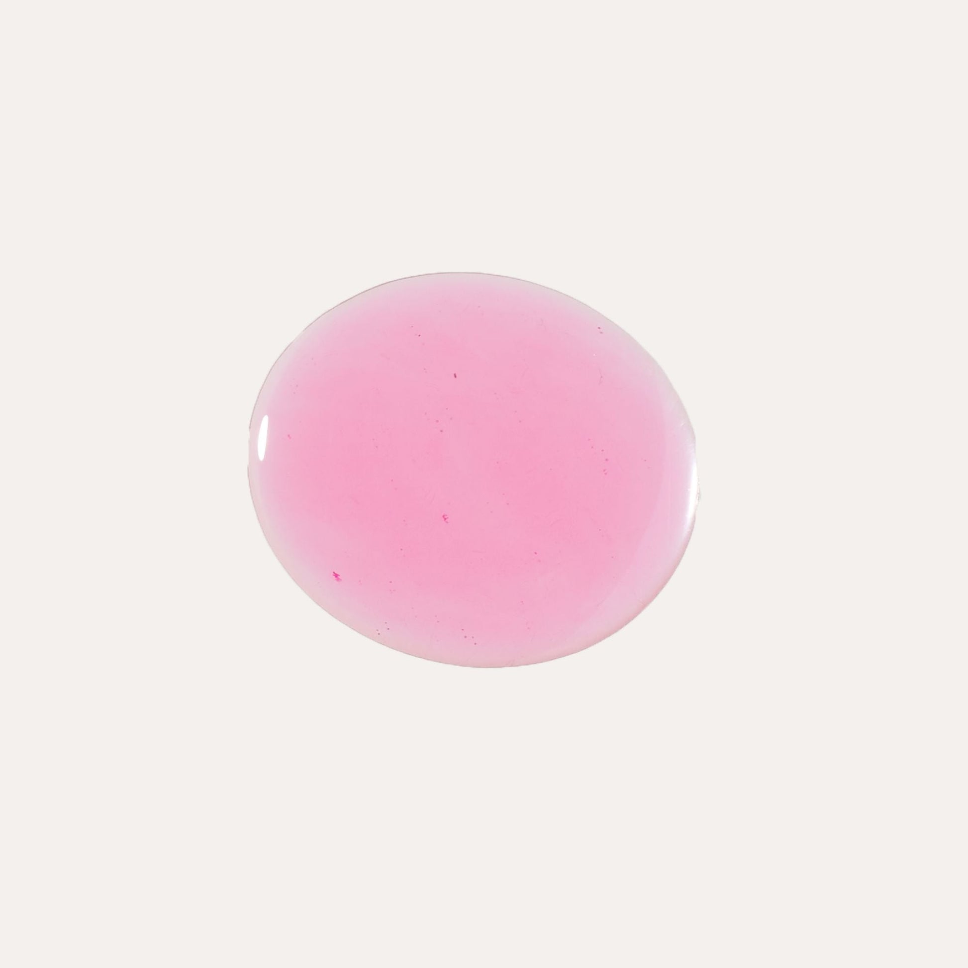 Pink lip oil gloss drop with glossy, high-shine surface