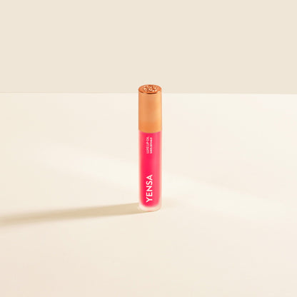 Lip nourishing oil tube with gold cap and bright pink body, labeled YENSA