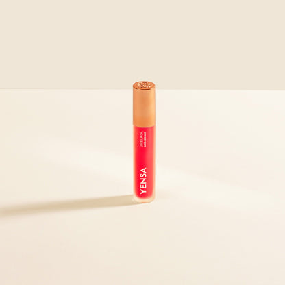Red lip nourishing oil tube with gold cap and YENSA branding
