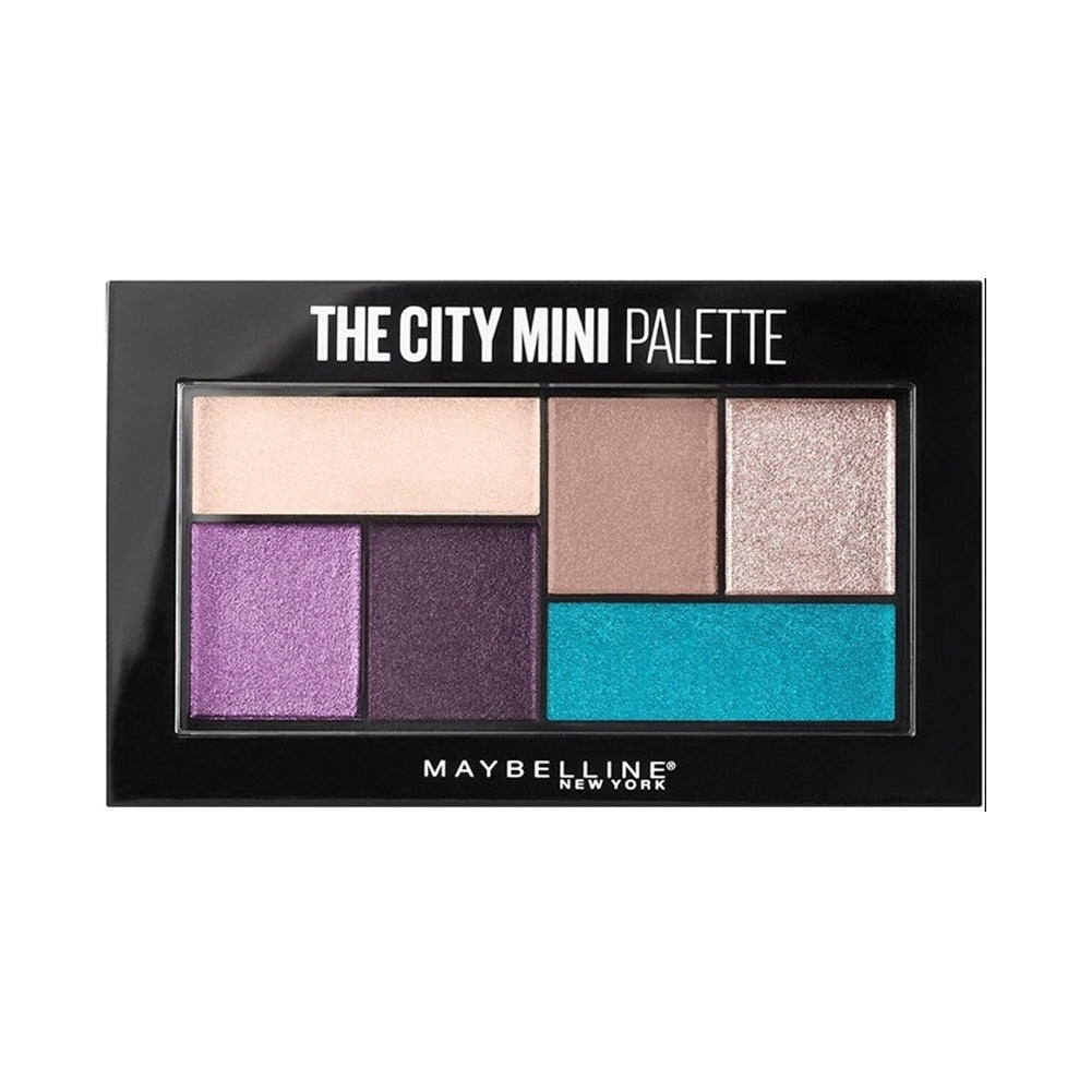 Maybelline City Mini eyeshadow palette with purple, teal, gold, mauve tones