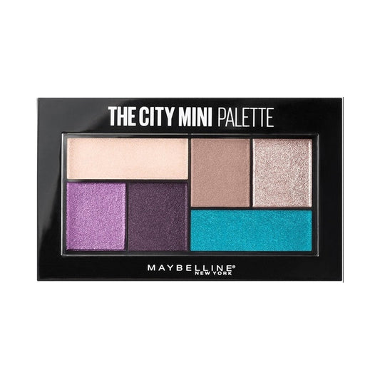 Maybelline City Mini eyeshadow palette with purple, teal, gold, mauve tones