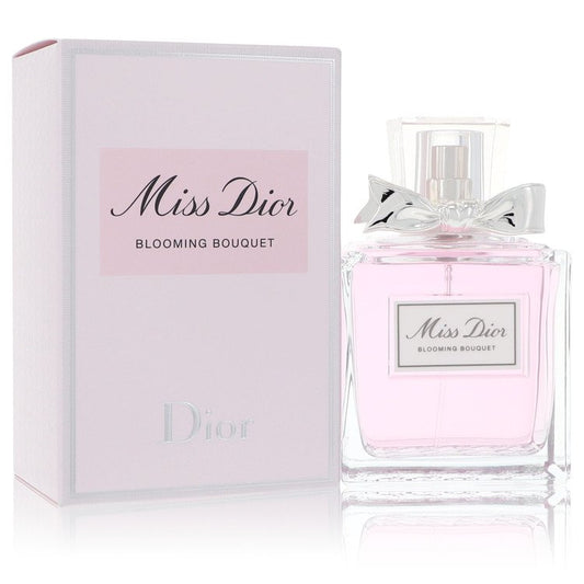 Miss Dior Blooming Bouquet eau de toilette spray bottle with pink liquid and bow, shown with box