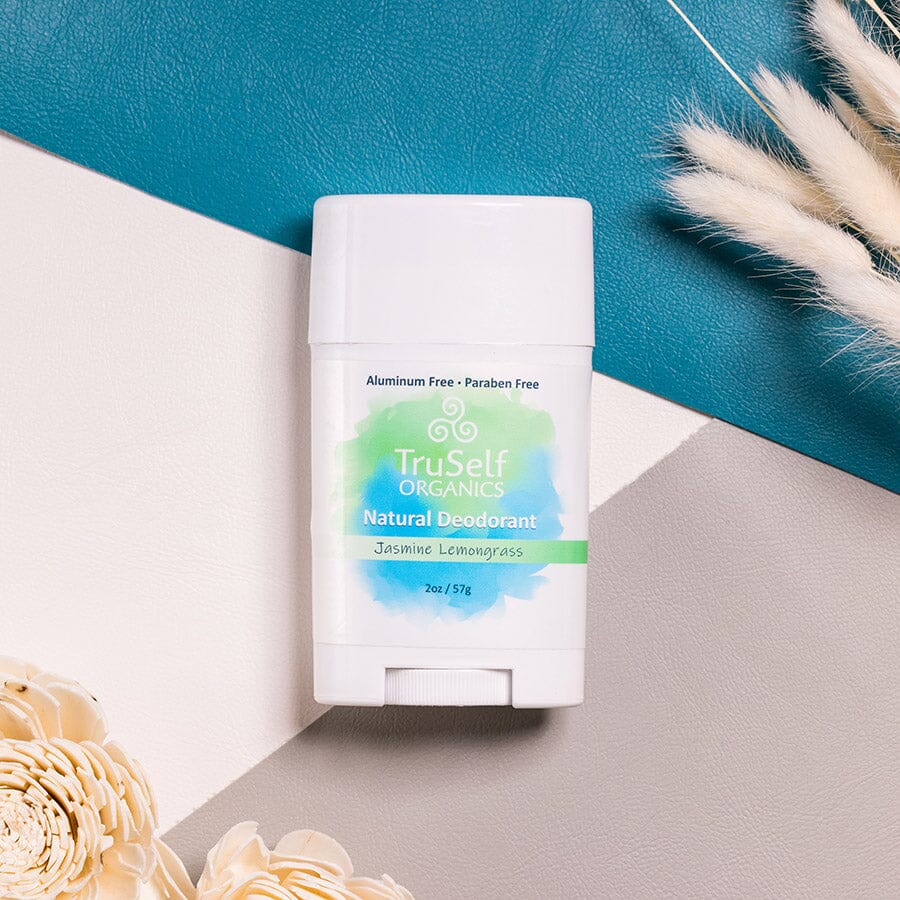 Deodorant stick in white with TruSelf Organic label, Jasmine Lemongrass.