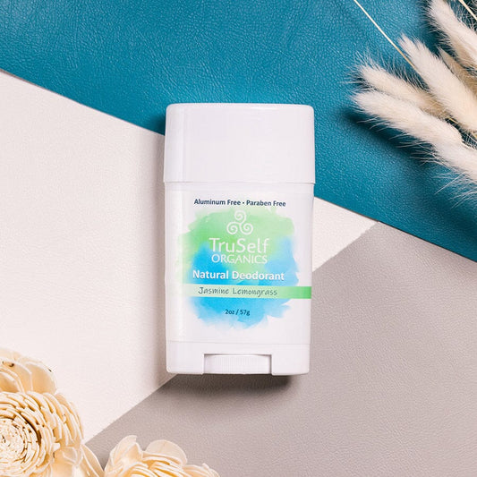 Deodorant stick in white with TruSelf Organic label, Jasmine Lemongrass.