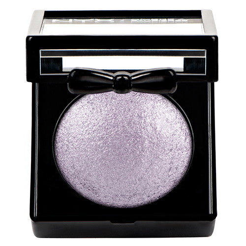 Baked eye shadow compact with round shimmery lavender-silver pan, lid open.