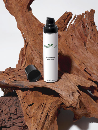 Ocean Mineral Moisturizer bottle with open black cap, TRUSELF branding