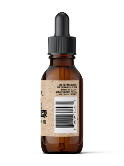 Johnny Slicks organic beard oil bottle back label with barcode, amber glass and black cap