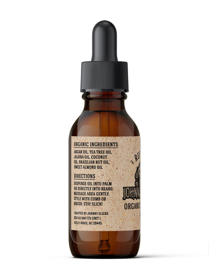 Johnny Slicks organic beard oil bottle ingredient panel, amber glass with black pump cap