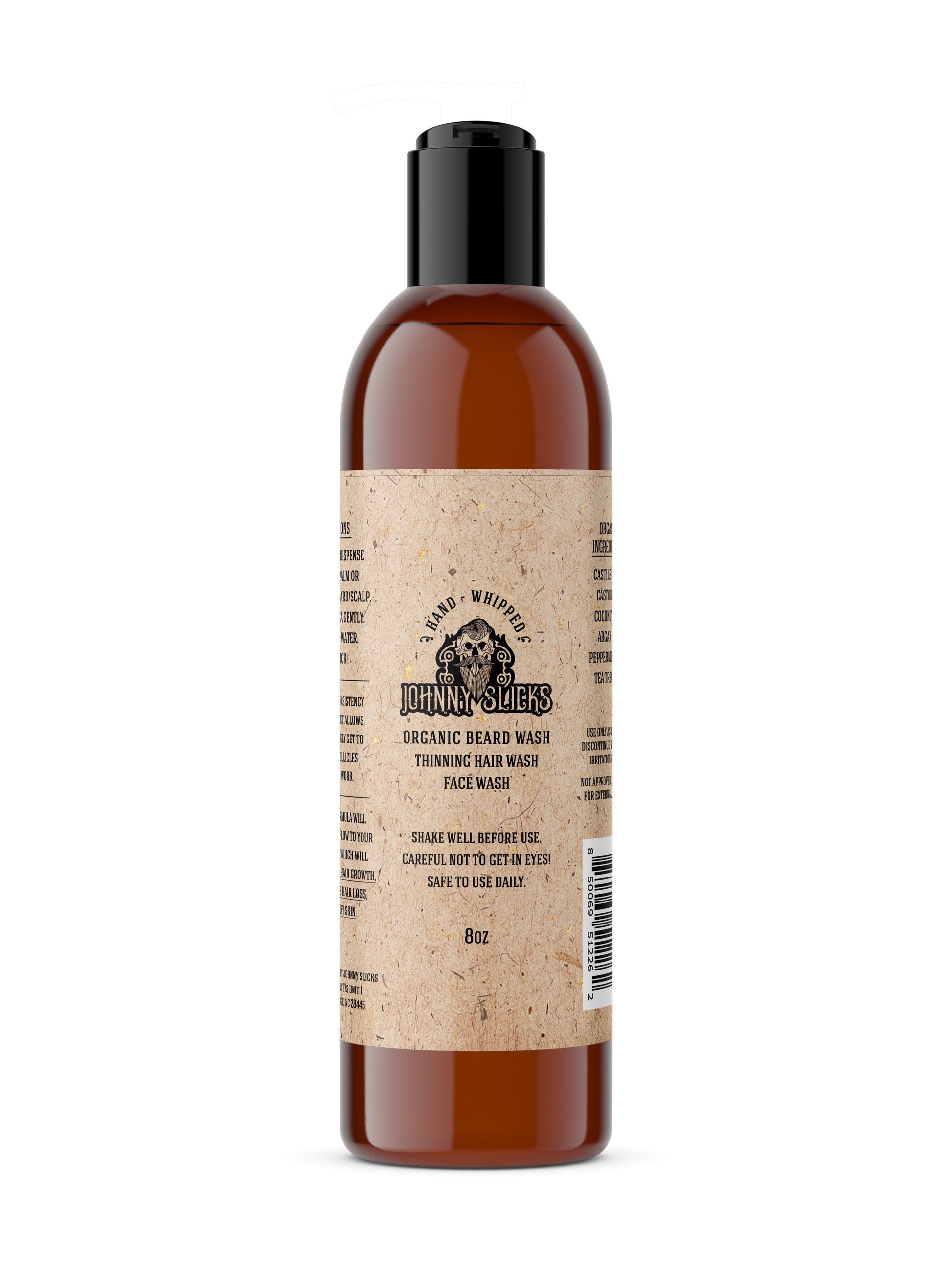 Johnny Slicks organic beard wash bottle, amber liquid, black pump cap.