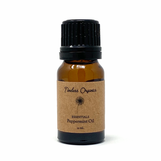 Amber glass peppermint essential oil bottle with black ribbed cap