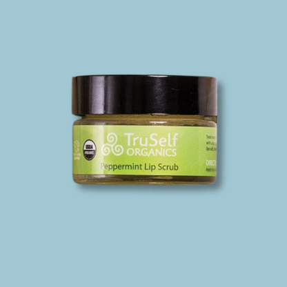 TruSelf ORGANICS peppermint lip scrub jar with black lid and green label.