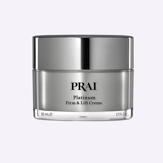 PRAI Platinum Firm & Lift Crème in silver glass jar with black lid, 50 mL