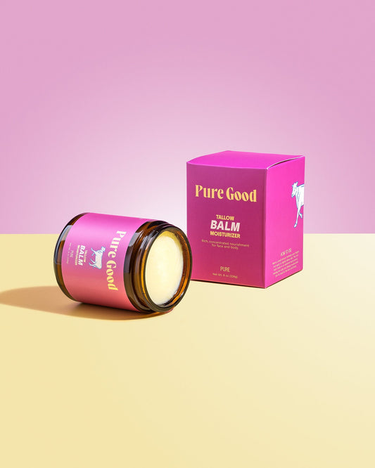 Tallow balm jar with open lid and matching pink box, black cap