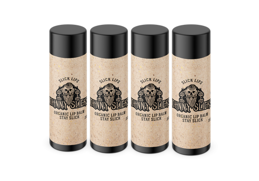 4-pack of organic lip balms with black caps, beige speckled tubes, Johnny Slicks branding.