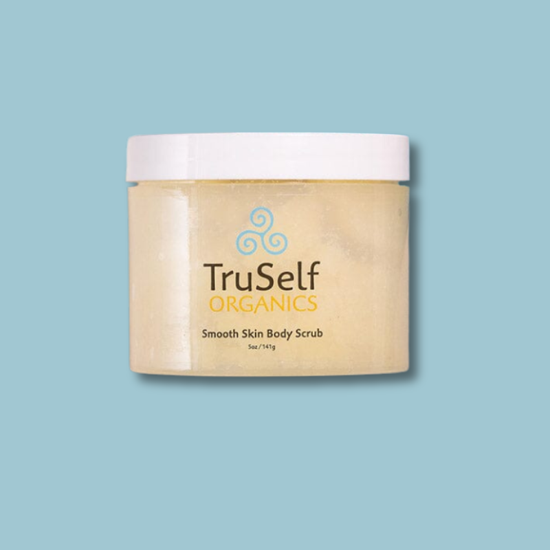 TruSelf Organics body scrub jar with white lid and beige scrub; label on front