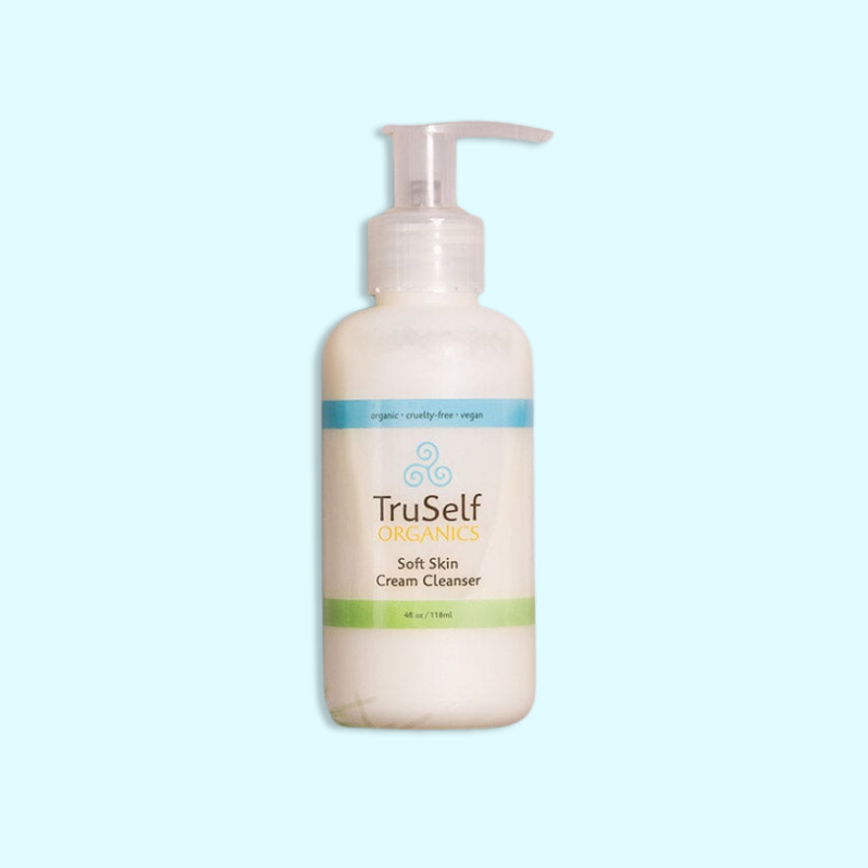 Cream cleanser bottle with pump, white bottle and green label strip