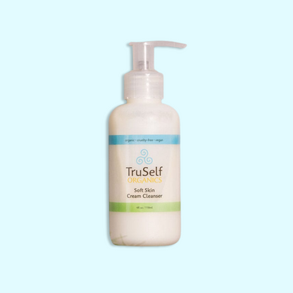 Cream cleanser bottle with pump, white bottle and green label strip