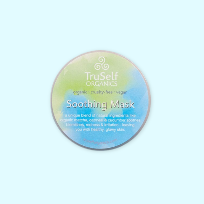 Soothing face mask jar with holographic green-blue label reading Soothing Mask