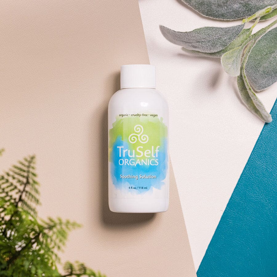 Soothing Solution bottle with white cap and green-blue swirl label, 4 fl oz