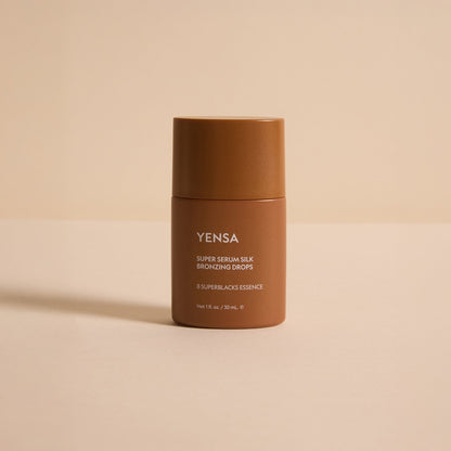 Bronzing serum bottle, dark bronze container with YENSA label and flip-top cap