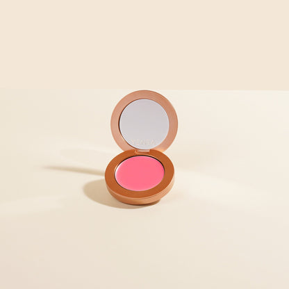 Cream blush compact with mirror open, bright pink pan