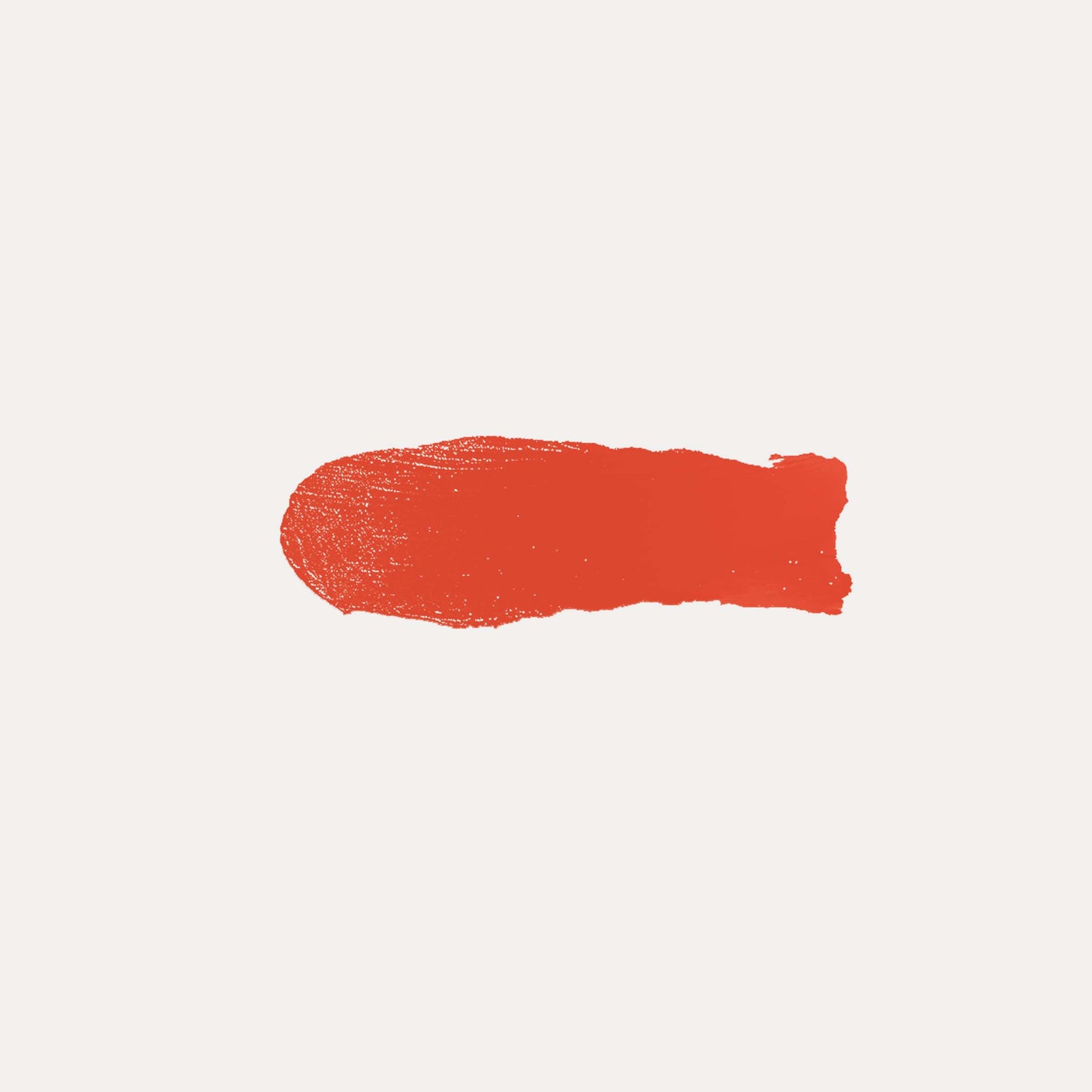 Cream blush swatch, bright coral-red paint stroke on light background.