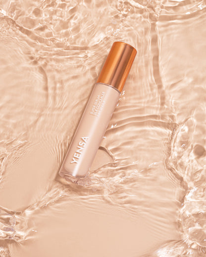 Silk concealer bottle with rose-gold cap, light beige shade