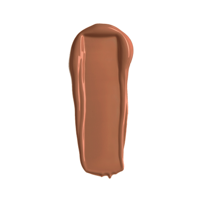 Liquid concealer swatch in warm brown, glossy smooth smear