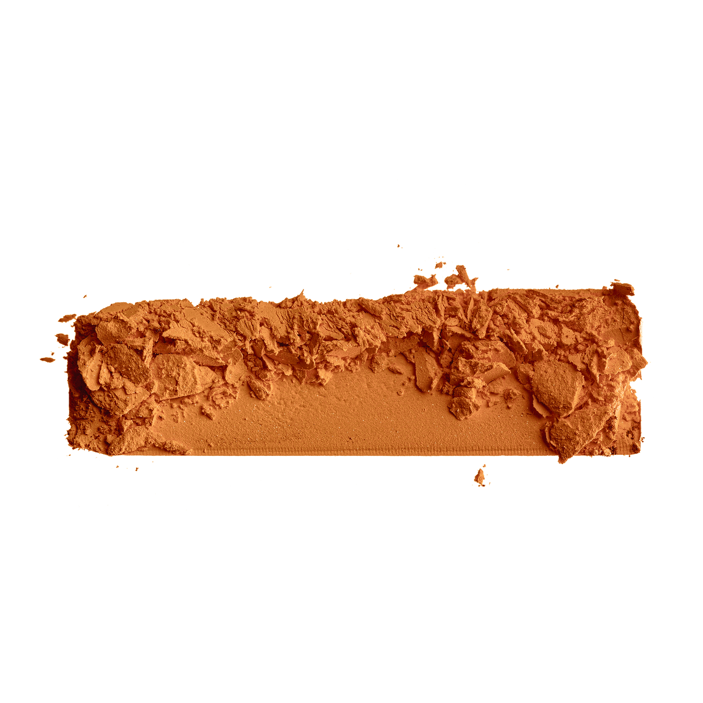 Orange-brown matte powder swatch with sculpted textured surface