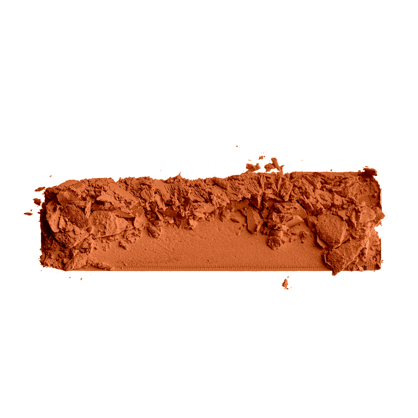 Pressed foundation powder sample in medium-deep tan, crumbled and textured