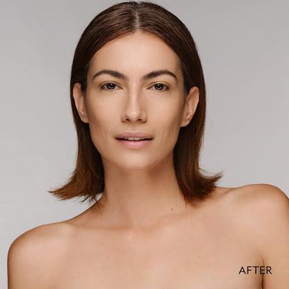Woman showing smooth matte finish after applying powder foundation