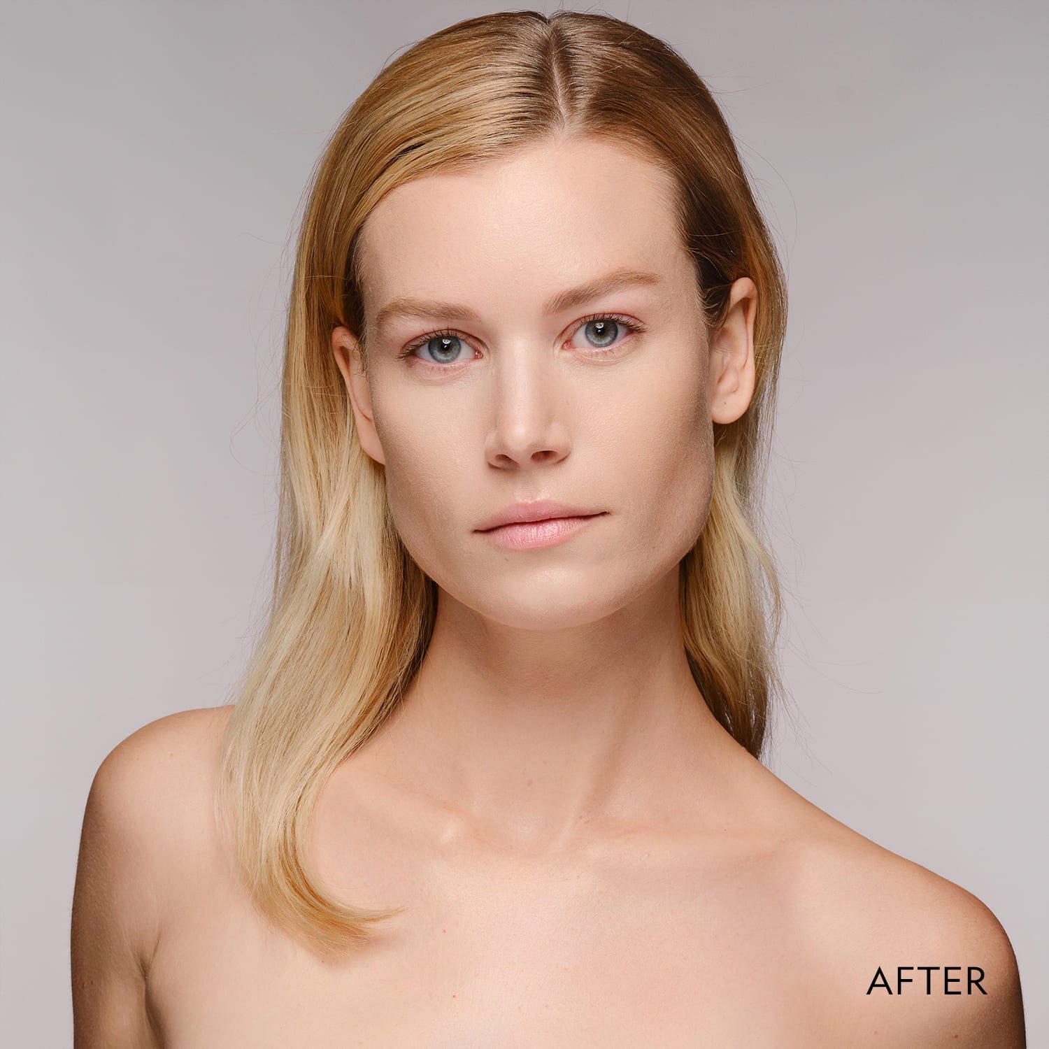Woman wearing powder foundation with smooth matte look, after application