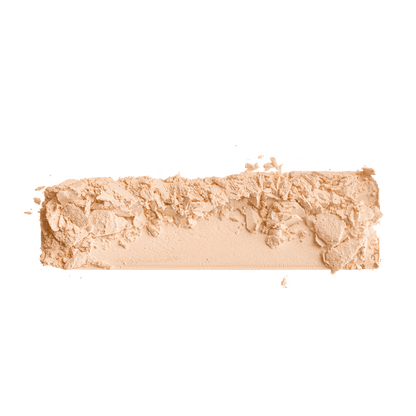 Powder foundation shade swatch, light peach-beige matte powder with textured surface