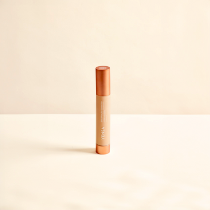 YENSA liquid foundation tube with orange cap and beige product body